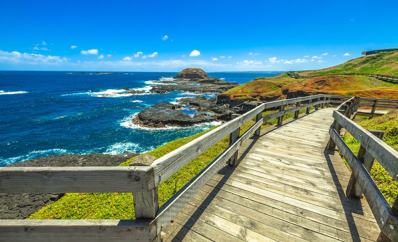 The boardwalks outside The Nobbies center overlook Seal Rocks. Grant Point, western tip of Phillip Island, Victoria, Australia.